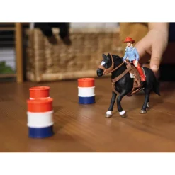 Figurines Farm World : Cowgirl et Tonneaux de Racing - Schleich