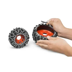 Tracteur Claas Axion 950 avec chaînes à neige et lame de niveleuse - Bruder